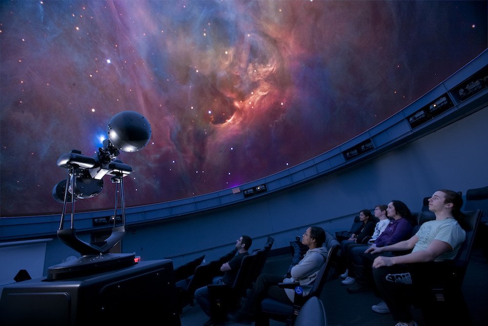 a wide angle shot of space in the planetarium