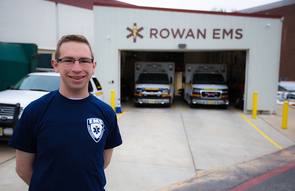 Kevin standing in front of EMS building.