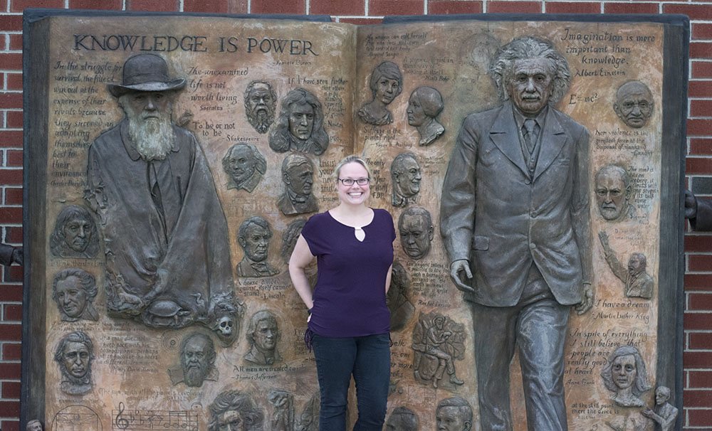 Ramona standing in front of Einstein statue on campus.