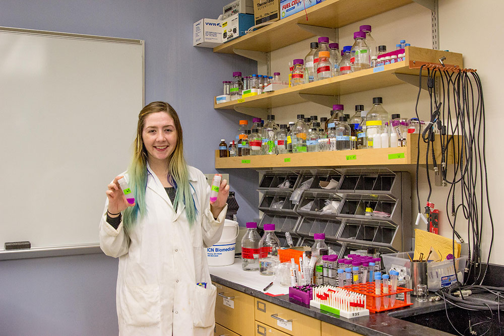 Kelso B., a biochemistry major, photographed in a lab