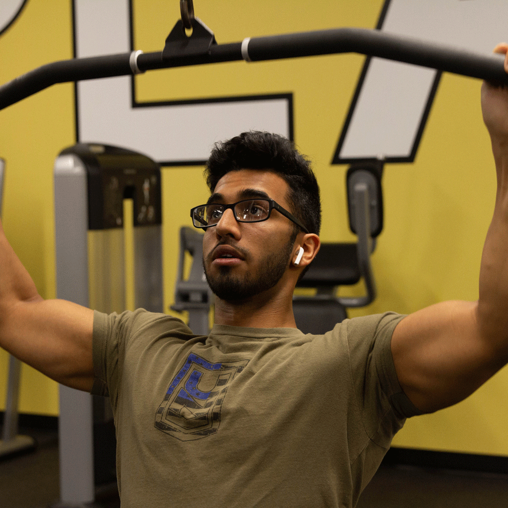 Krishna works out at the Rowan Fitness Center.