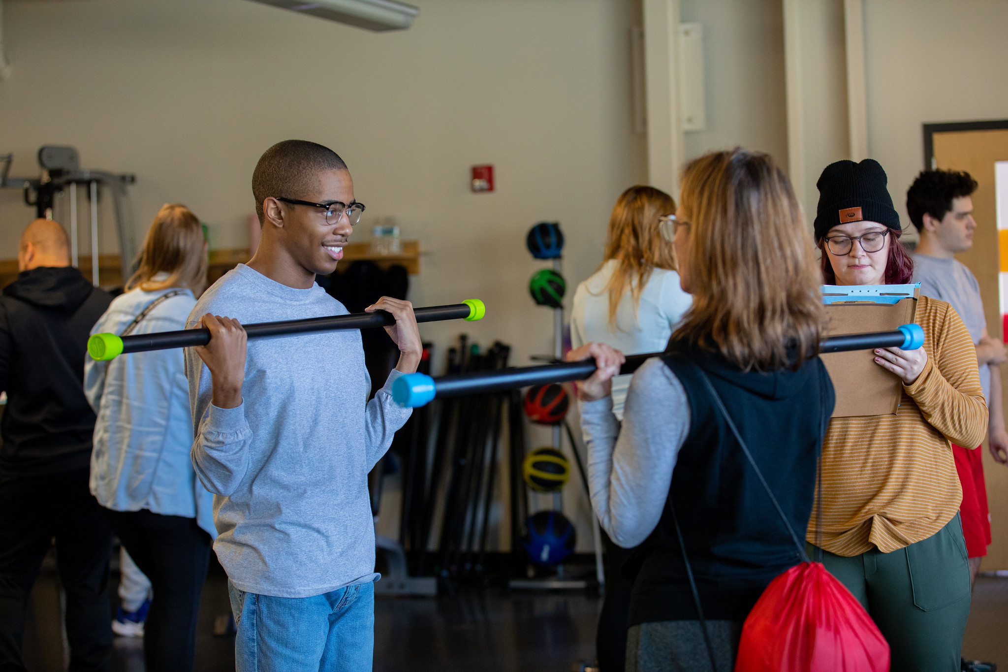 A student working at Rowan University's get fit program, to illustrate public health and wellness major.