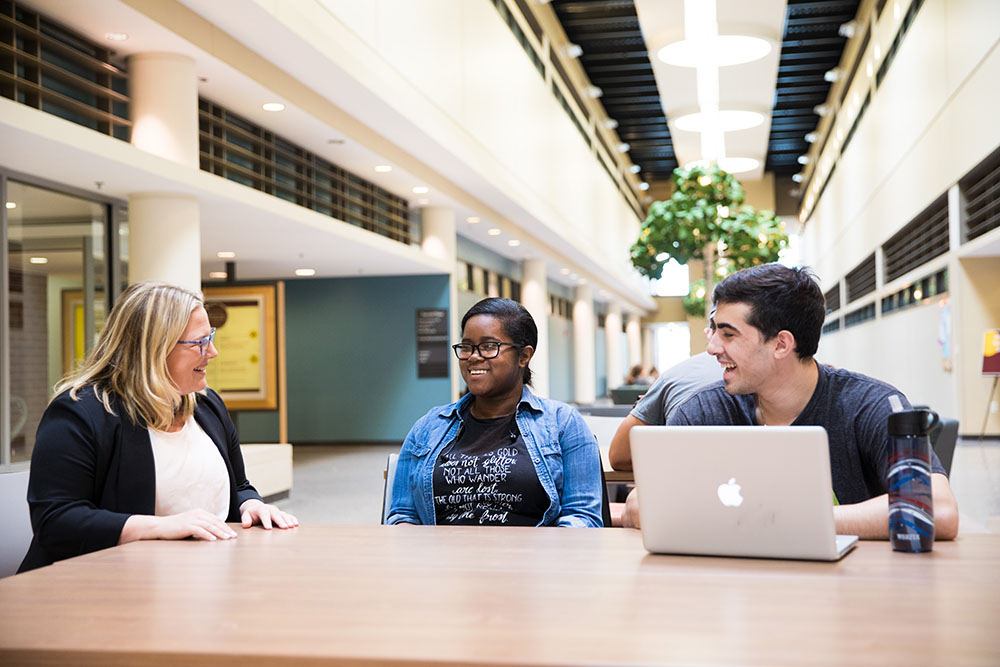 students meeting inside James Hall