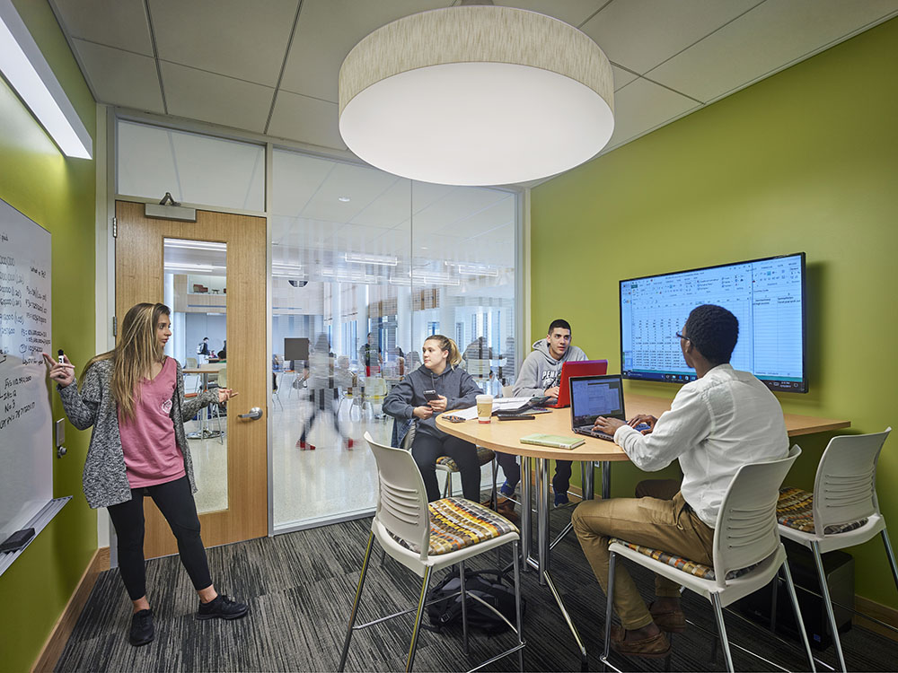 Students talking around a table