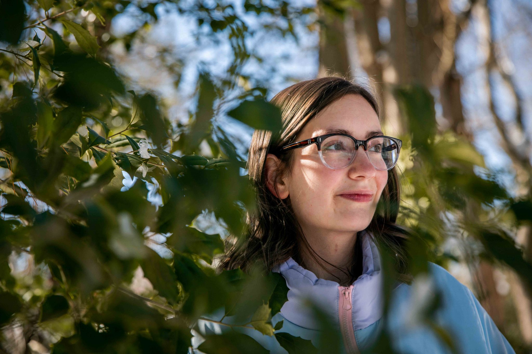 JoAnna standing behind the woods in Engineering Hall.