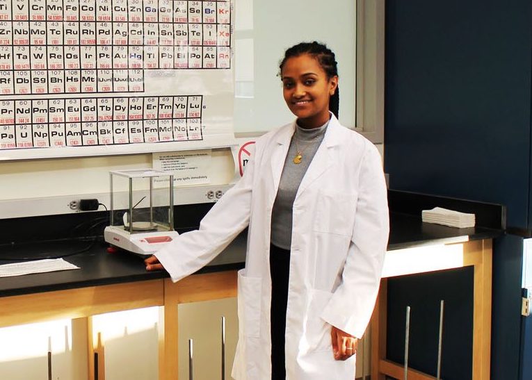 Biochemistry major Tsion A. in a lab