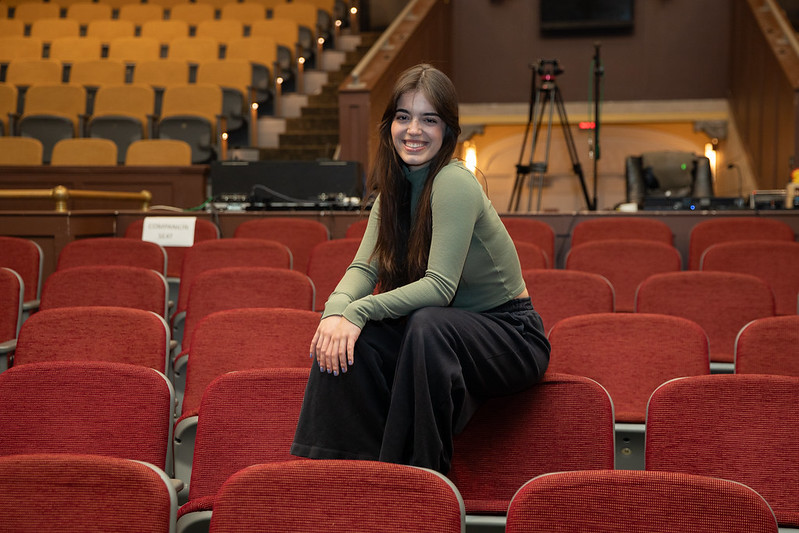 Gio works in theater on campus.