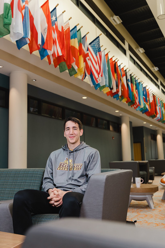 Marko sits in Education Hall 