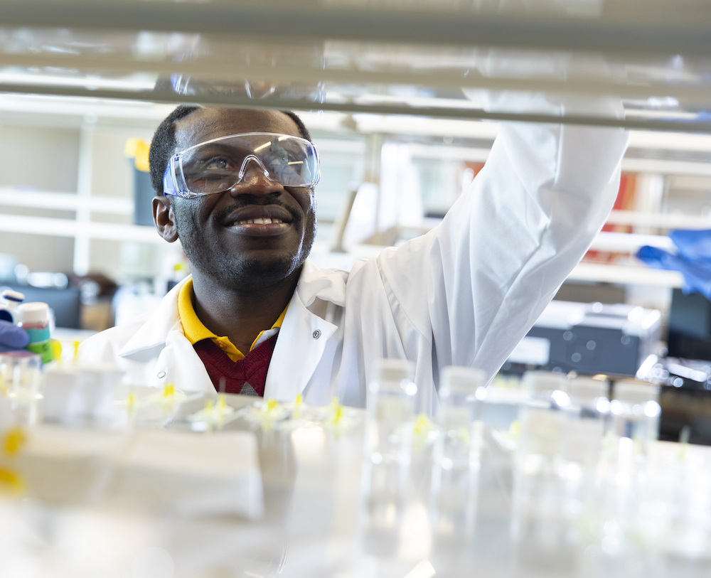 A male working in an engineering lab.